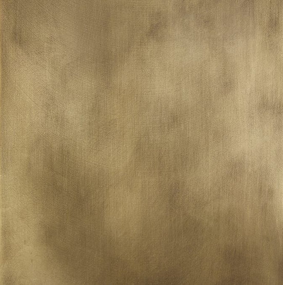 Hand-finished metal table base in brushed brass